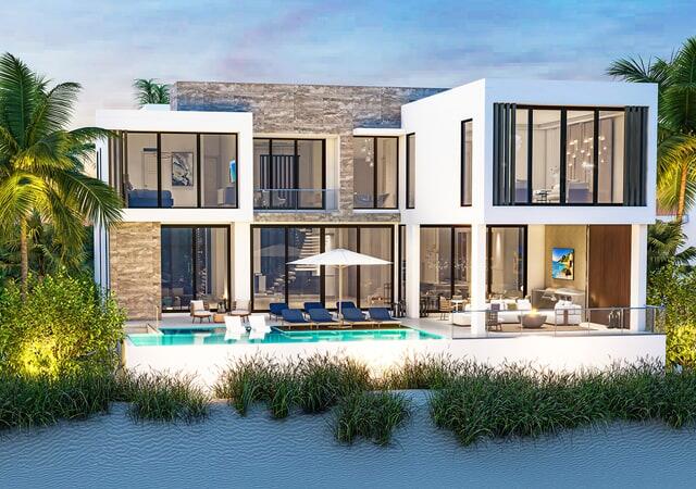 Sunset view of a beachfront modern luxury home featuring an in-ground pool surrounded by sand dunes, beach, and palm trees.