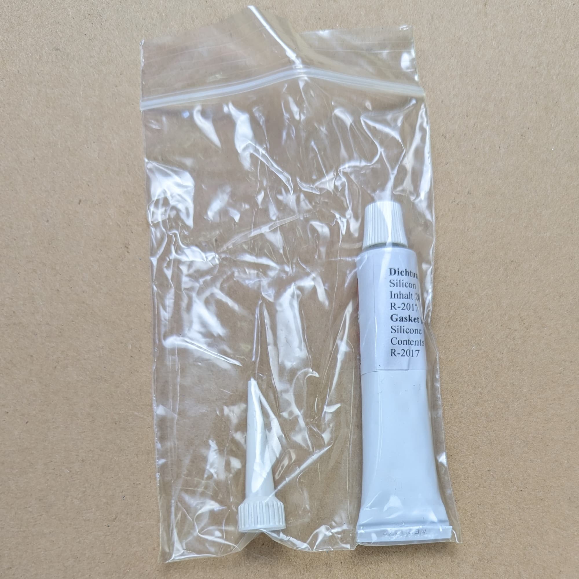 Ремкомплект уплотнителя вала сальник + крышка 10393 Ремкомплект уплотнителя вала сальник + крышка 10393