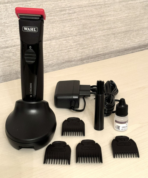Триммер в комплекте с док-станцией Wahl Charge Stand S08171-7080   Ищете идеальное решение для профессиональной и аккуратной стрижки волос? Познакомьтесь с триммером Wahl Detailer Li Gold, который предоставит вам бескомпромиссную точность и удобство испол фото
