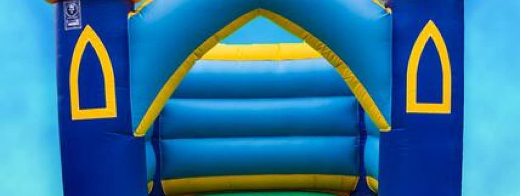 How often should a bouncy castle be inspected for safety?