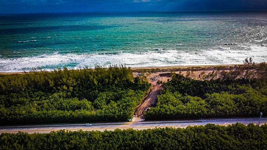 aerial view of land clearing construction site on the beach