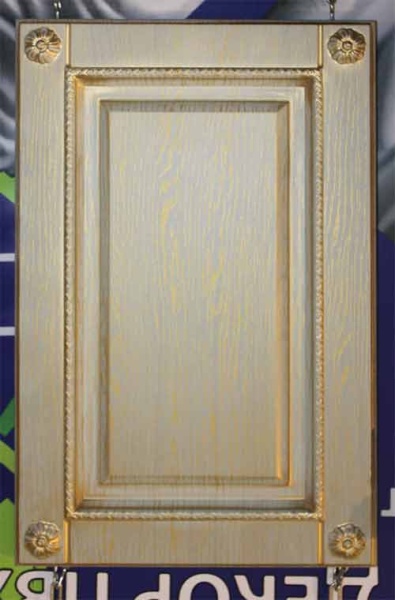 Декоративная розетка из гибкого ПВХ SY 0882 на мебельном фасаде - пример использования.