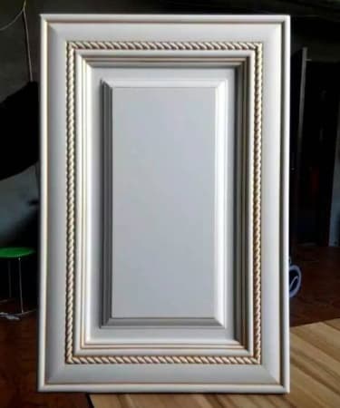 Декоративный модинг косичка SY 60 на мебельном фасаде.