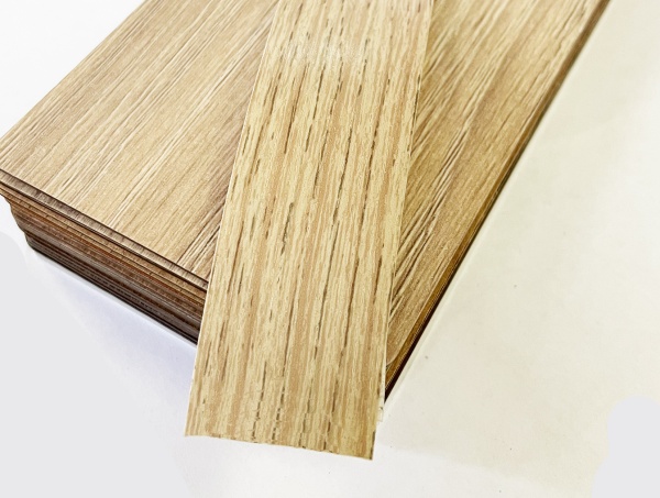 Кромочная лента ПВХ 0,4*19 мм BR459 с плитой ЛДСП 16 мм ясень ориноко светлый.