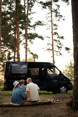 family enjoying time camping site