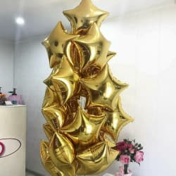 Облако из золотых фольгированных звезд