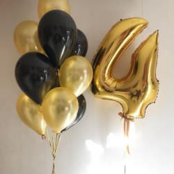 Золотые и черные шары с цифрой 