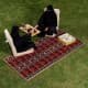 Alsanidi, a floor seating mat for trips, camping, and desert outings, padded with sponge, traditional rug, wooden *oudi.