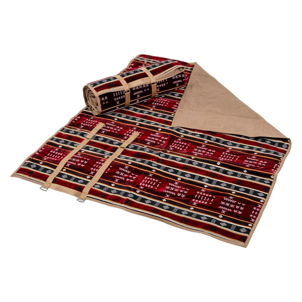 Alsanidi, a floor seating mat for trips, camping, and desert outings, padded with sponge, traditional rug, wooden *oudi.