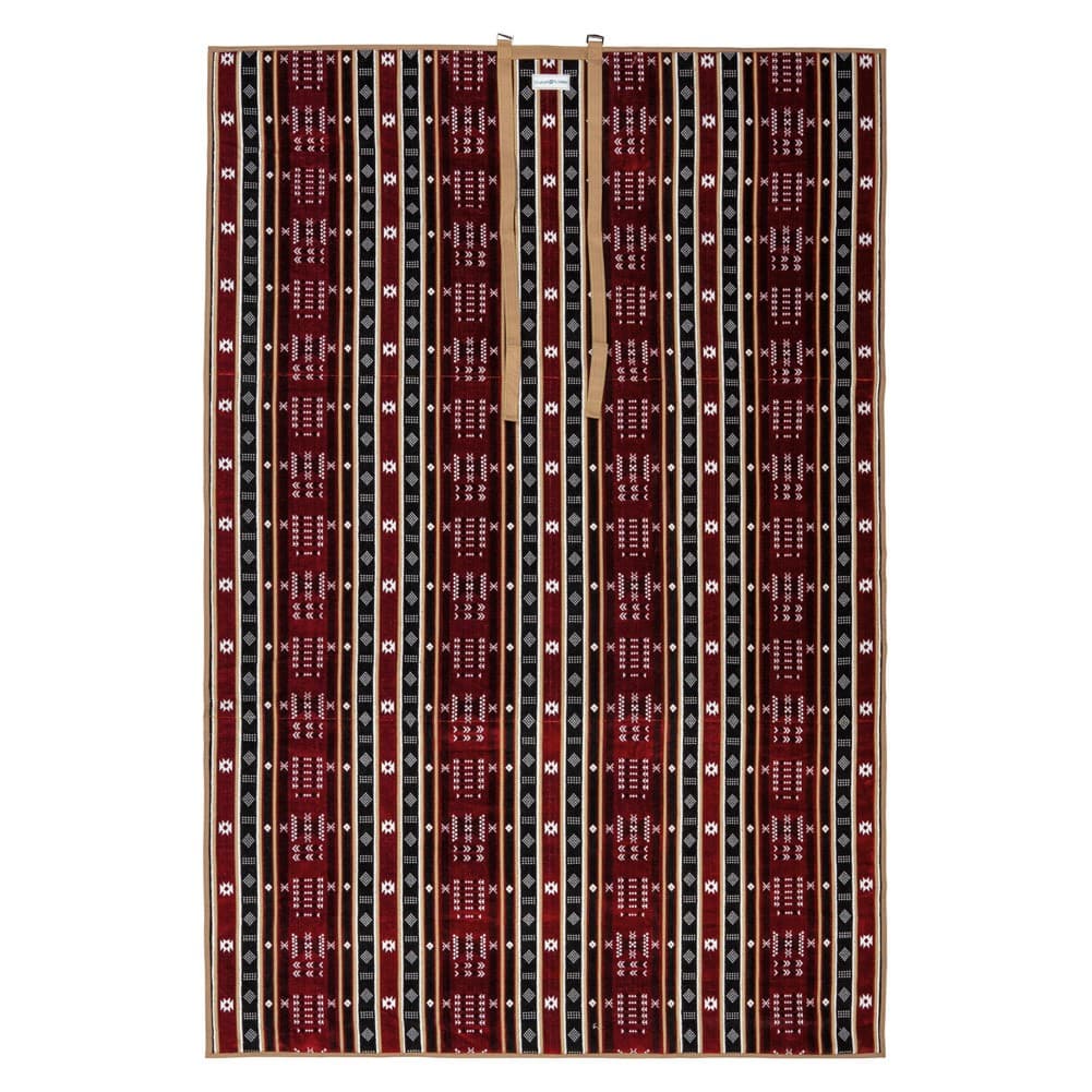 Alsanidi, a floor seating mat for trips, camping, and desert outings, padded with sponge, traditional rug, wooden *oudi.