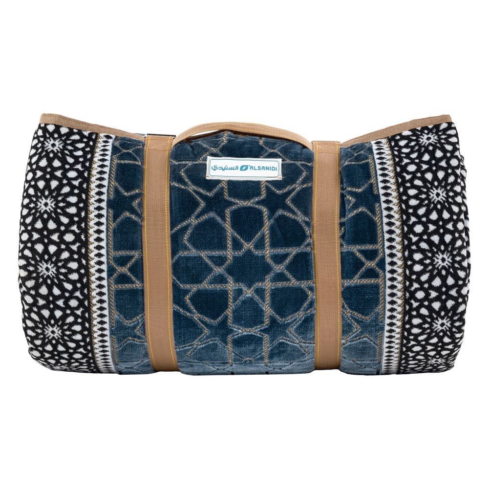 Alsanidi, a floor seating mat for trips, camping, and desert outings, padded with sponge, traditional rug, wooden *oudi.