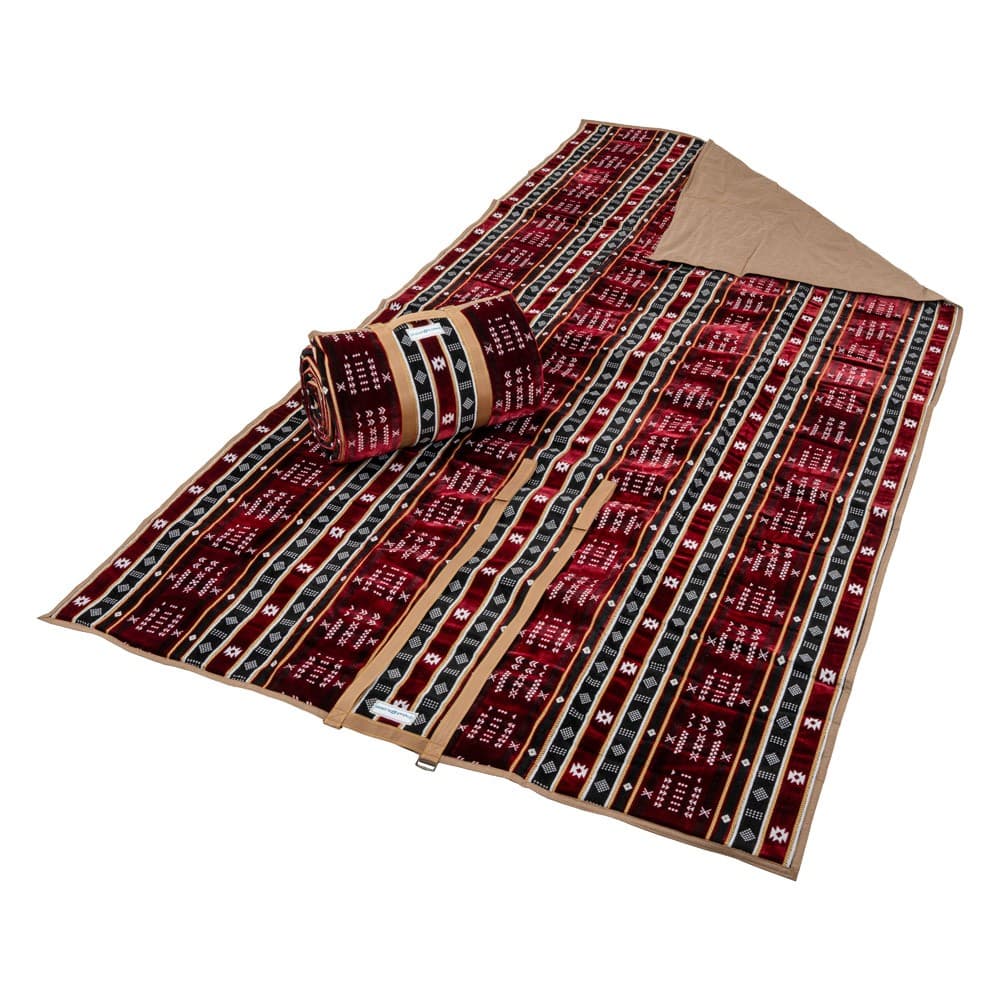 Alsanidi, a floor seating mat for trips, camping, and desert outings, padded with sponge, traditional rug, wooden *oudi.