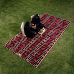 Alsanidi, a floor seating mat for trips, camping, and desert outings, padded with sponge, traditional rug, wooden *oudi.