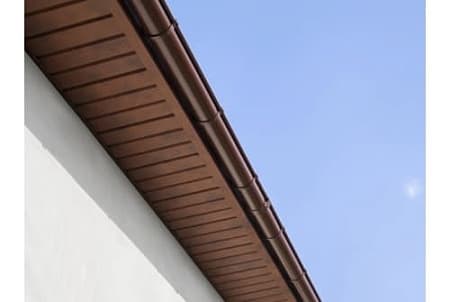 Софит металлический с центральной перфорацией Grand Line / Гранд Лайн, GreenCoat Pural Matt 0.5, цвет RR 32 темно-коричневый (Ral 8019)