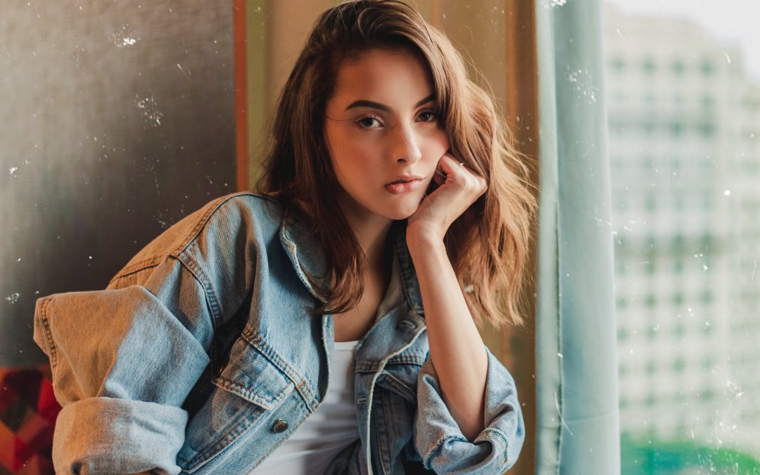 Young Woman With Long Hair Dressed In Denim Jacket Stock Photo - Download  Image Now - Adult, Adults Only, Bag - iStock