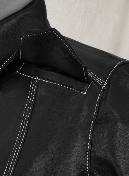 Sophie Turner spotted in a beige blazer, black leather mini-skirt