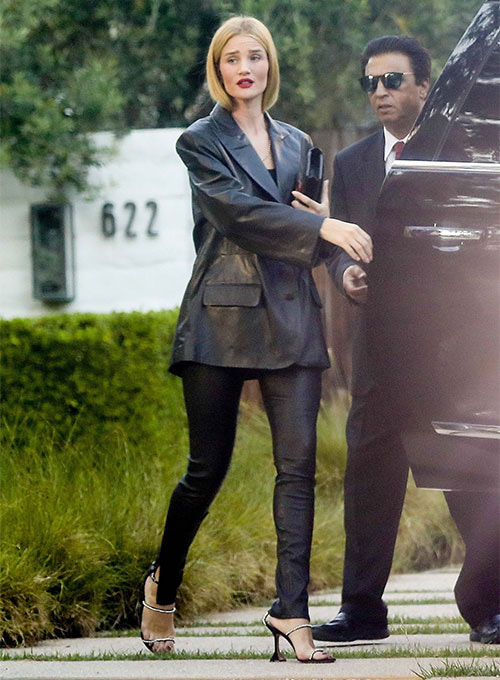 Rosie Huntington-Whiteley in black jacket and black leggings on