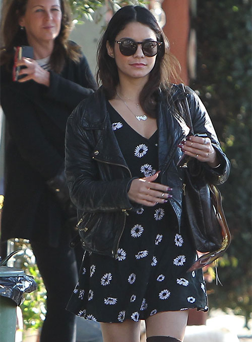 Vanessa Hudgens in black leather and shearling jacket and ripped