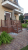 картинка Крыльцо 3 ступени с площадкой с дверцей и ДПК перилами от магазина "Заказ Кровли"